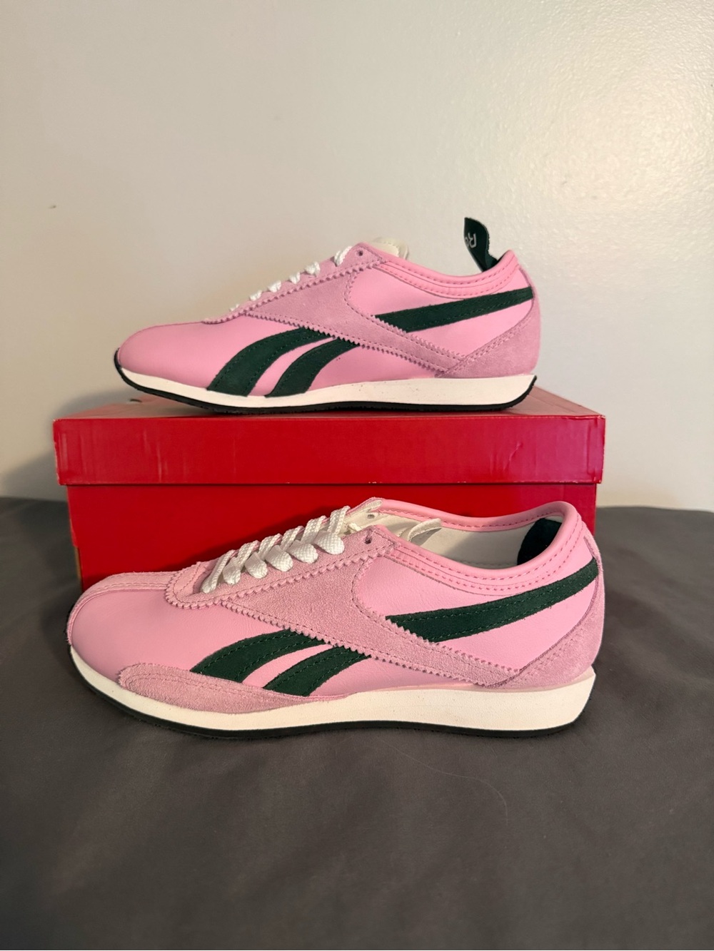 Reebok Women's Pink Sneakers with Dark Green Accents